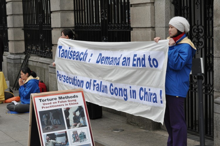 Before Taoiseach (Prime Minister) Enda Kenny's recent trip to China, Falun Gong practitioners held a rally outside government buildings where they asked him to demand an end to the persecution of Falun Gong when he met the leaders in China (Martin Murphy/The Epoch Times)