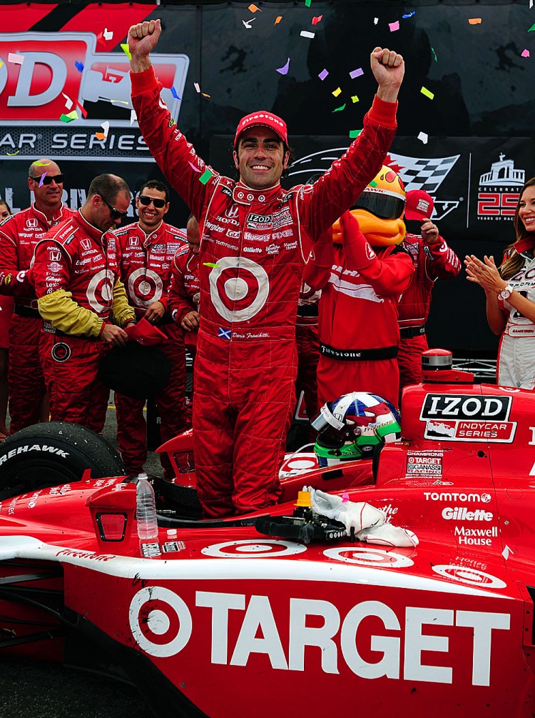 Dario Franchitti celebrates after winning the Honda Indy Toronto IndyCar race. (Robert Laberge/Getty Images)
