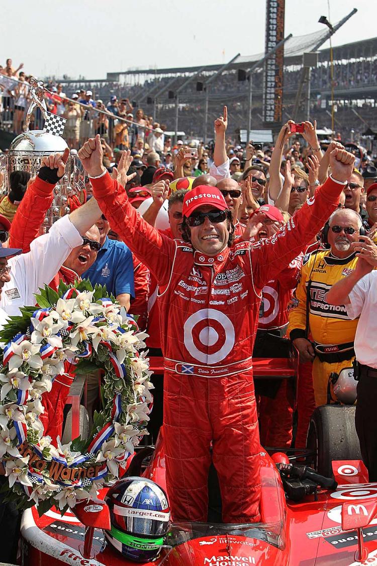 Dario Franchitti celebrates in victory lane after winning the IZOD IndyCar Series 94th running of the Indianapolis 500. (Nick Laham/Getty Images)