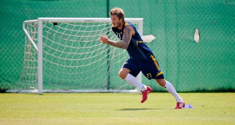 David Beckham of the Los Angeles Galaxy warms up during a training session at on August 11, 2010 in Carson, California. (Kevork Djansezian/Getty Images)