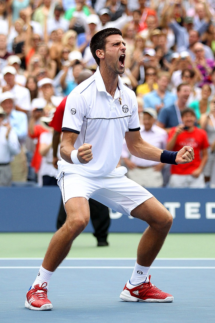 VICTORY: Novak Djokovic celebrates his five set comeback victory over Roger Federer in the semifinal match at the US Open on Super Saturday on Arthur Ashe Stadium in Flushing, New York. Djokovic will face defending Champion Rafael Nadal in the final on Monday. (Matthew Stockman/Getty Images)