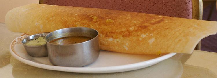 A plate of Dosa with Chutney and Sambhar (Wikimedia)