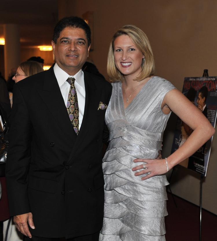 Dr. Dutt (L) with friend at the Kennedy Center on Feb. 10 (Dai Bing/The Epoch Times)