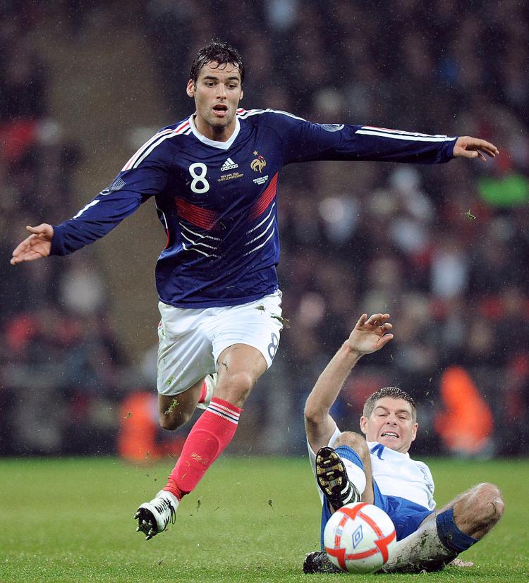 LOOKING GOOD: France midfielder Yoann Gourcuff evades England's Steven Gerrard during an international friendly match at Wembley on Nov. 17. (Franck Fife/AFP/Getty Images)