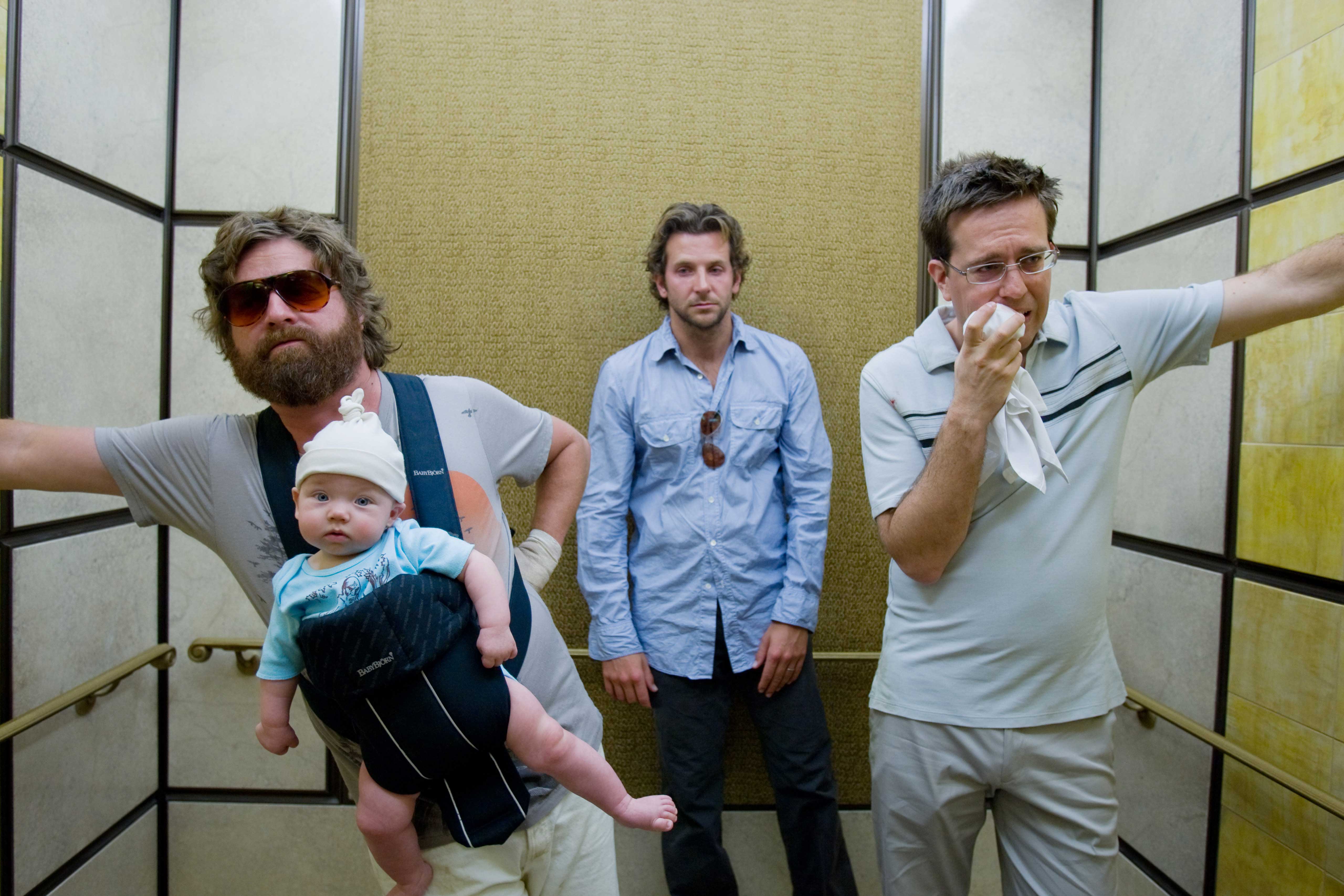 Zach Galifianakis, Bradley Cooper and Ed Helms confront the cold light of day in 'The Hangover'