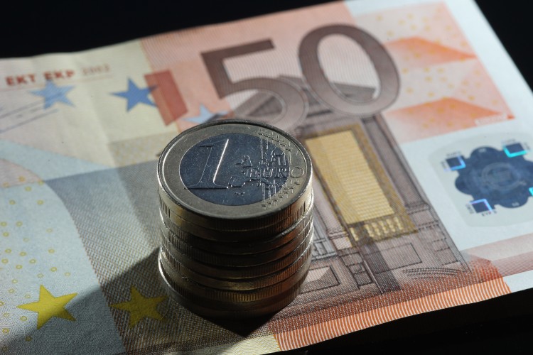 WASTED INCENTIVES: A stack of euro coins sits on top of a 50 euro note in this stock photo. Irish start-up enterprises are foregoing substantial government incentives due to a lack of awareness of what support is available (Dan Kitwood/Getty Images)