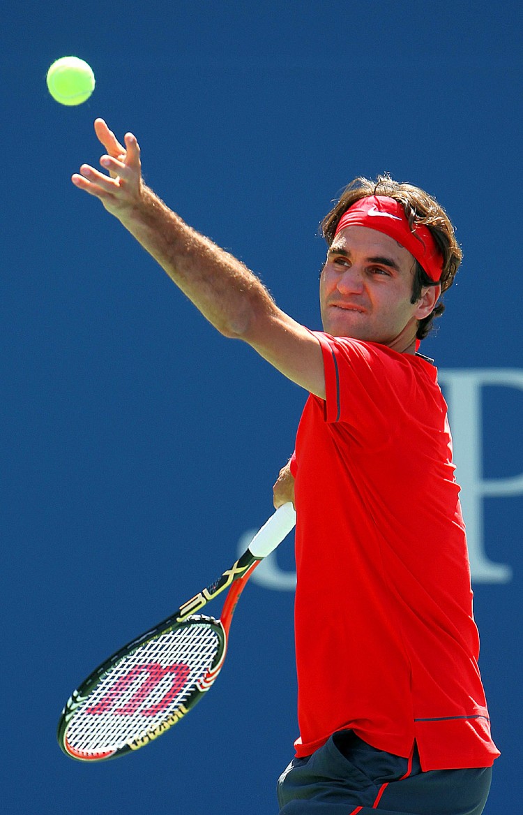 Roger Federer serves against Dudi Sela during Day Four of the 2011 US Open. (Michael Heiman/Getty Images)