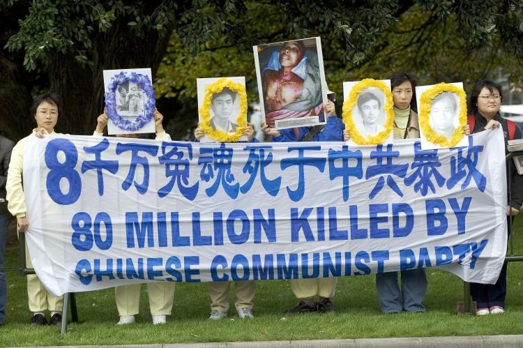 Protesters wait outside Parilament buildings for arrival of Chinese Premier Wen Jiabao at on April 6, 2006 in Wellington, New Zealand. The recent U.S.-China human rights dialogue presents an opportunity to reflect on human rights in China, in the context of country's rise. (Marty Melville/Getty Images)
