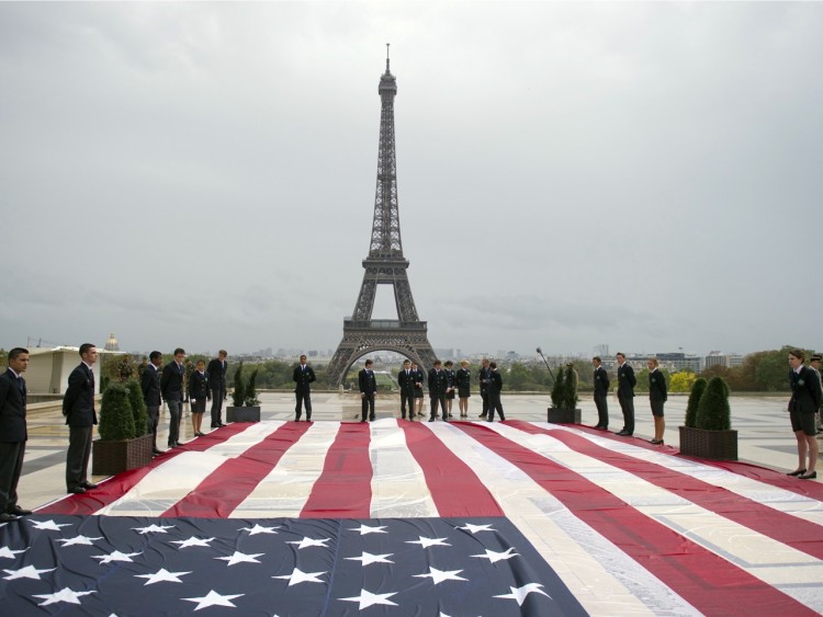 A giant U.S. flag is displayed in front of the Eiffel tower during a solemn tribute to the victims of the 9/11 attacks on Sunday at the Trocadero square in Paris.  (Miguel Medina/AFP/Getty Images)