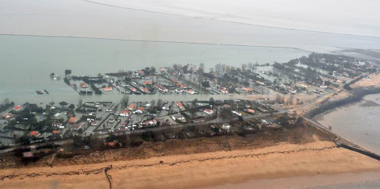 Aerial view shows flooded houses and streets on the Atlantic seaboard between La Rochelle and L'Aiguillon-sur-Mer, western France, on March 1. The Xynthia storm battered the coast the previous day, killing at least 50 people, driving huge waves inland in  (Frank Perry/AFP/Getty Images)