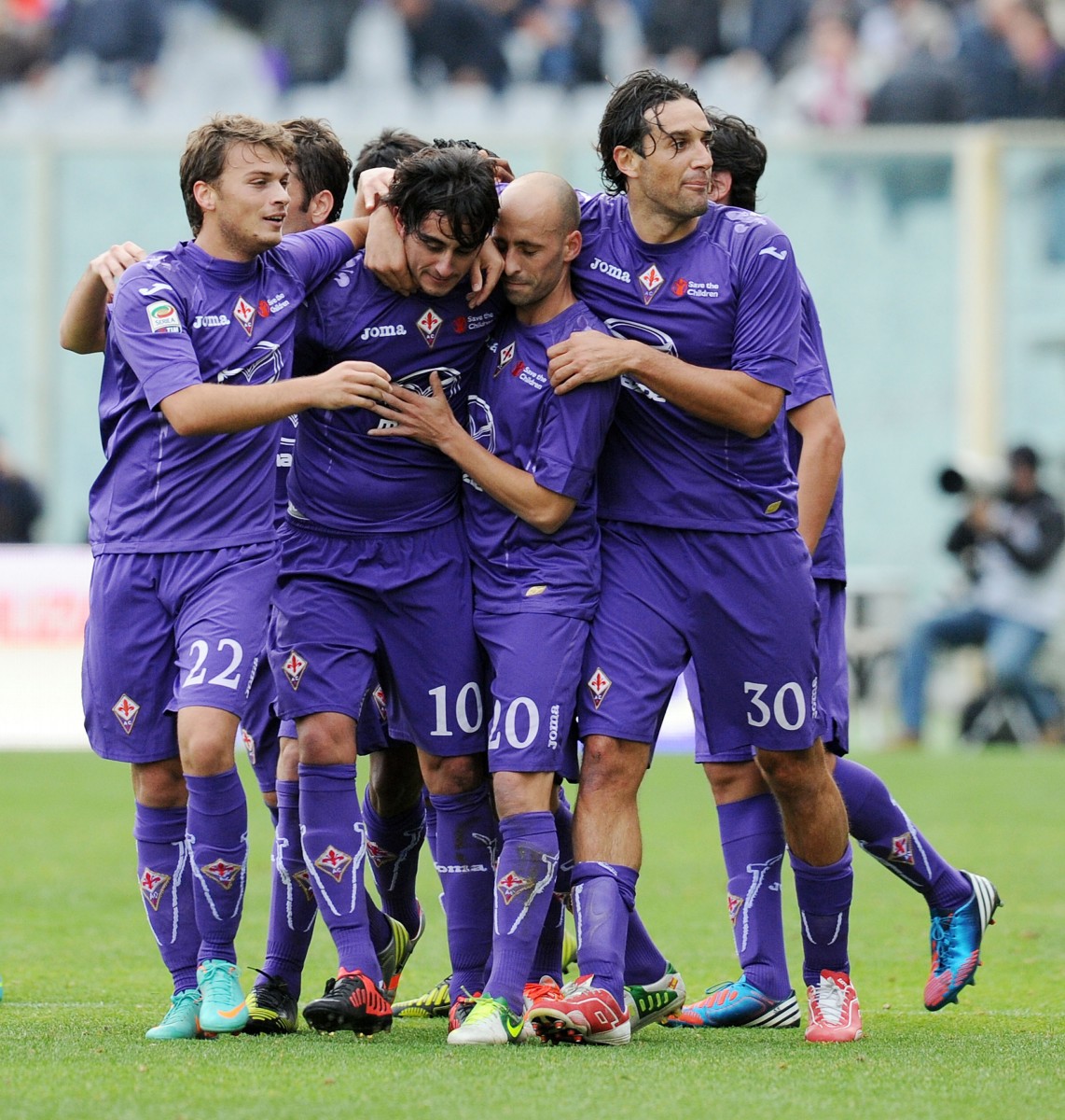 Alberto Aquilani (No. 10) is congratulated by teammates against Atalanta on Sunday at Artemio Franchi Stadium in Florence, Italy. He was the hero with two goals and an assist. (Giuseppe Bellini/Getty Images) 