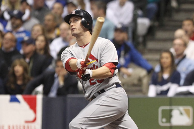 David Freese unloads a 3-run home run against the Brewers in Game 6 of the NLCS. Freese is batting .425 this postseason with four home runs. (Christian Petersen/Getty Images)