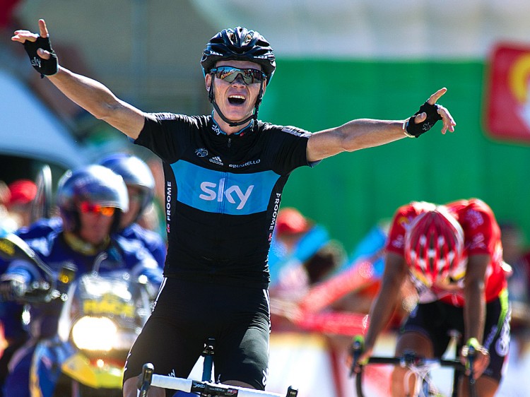 Chris Froome crosses the finish line just ahead of race leader Juan Jose Cobo to win Stage 17 of the 2011 Vuelta a España. (Jaime Reina/AFP/Getty Images)