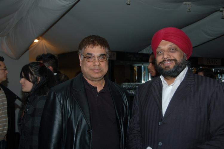 Mr. Jaswal (L) and Mr. Flora,  two business owners and friends,  said they were greatly impressed by the show.  (Matthew Little/The Epoch Times)