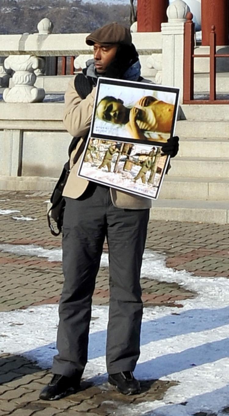 This file photo taken on January 12, 2010 shows human rights activist Aijalon Mahli Gomes taking part in a rally at Imjingak peace park near the closely-guarded South-North border in Paju. North Korea announced on April 7, 2010 it has sentenced US citizen Gomes to eight years of hard labour for an illegal border crossing and an unspecified hostile act. (Jung Teon-Je/AFP/Getty Images)