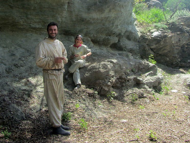 Giannis Zarikos (L) and Athina Taxtatzi take a break during their beekeeping work