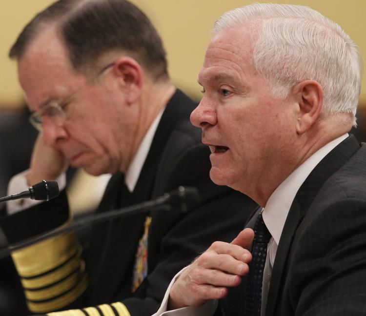 DEFENDING DEFENSE: Defense Secretary Robert Gates (R) and Chairman of the Joint Chiefs of Staff Adm. Mike Mullen (L), participate in a House Appropriations Subcommittee hearing, on March 2, in Washington. The subcommittee is hearing testimony on the budget request for the Defense Department. (Mark Wilson/Getty Images)