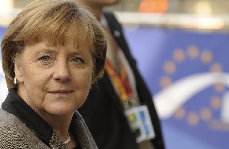 German Chancellor Angela Merkel arrives at the EU Headquarters for a European People's Party (EPP) enlarged summit in Brussels on Dec. 13, 2012. Germany's leading role in handling Europe's debt crisis will give a wider importance to the country's federal elections in 2013. (John Thys/AFP/Getty Images)  