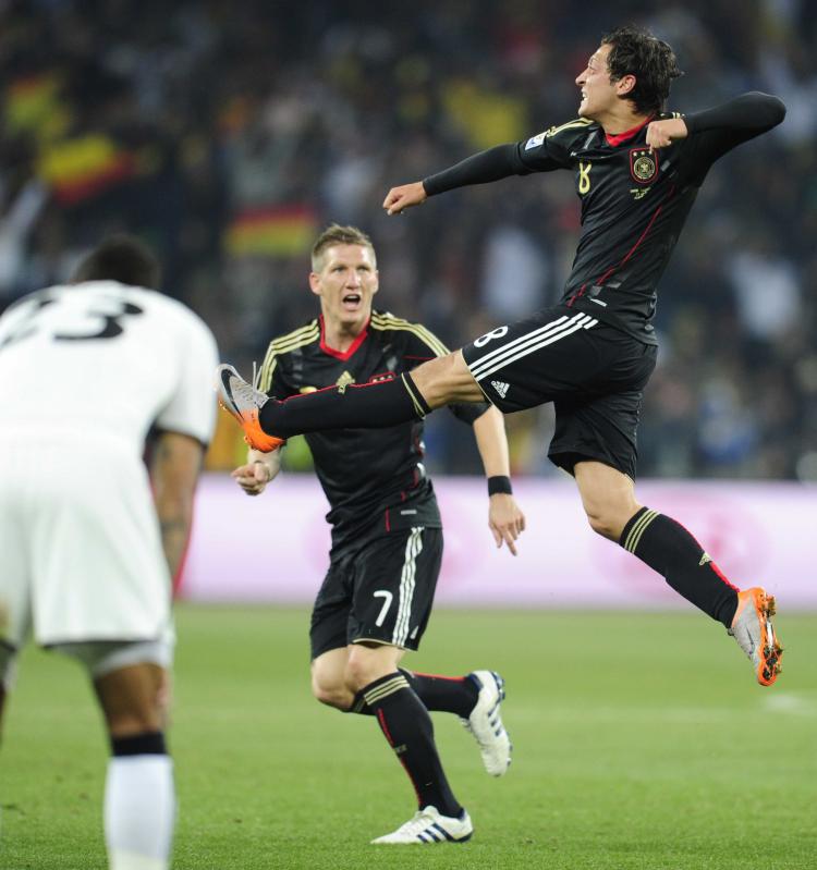 Mesut Ozil expresses his joy and relief after scoring against Ghana in Johannesburg on Wednesday.