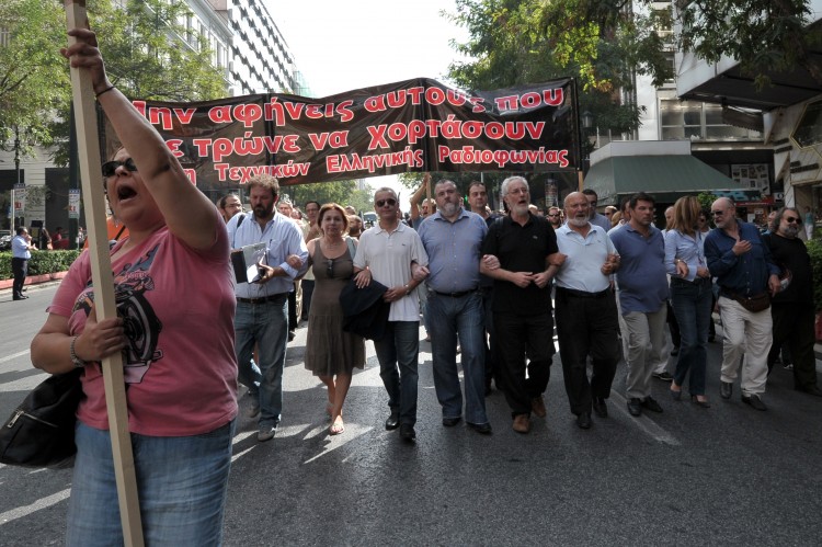 Journalists and radio-TV technicians march in central Athens during their 24-hours strike on October 17, 2012. (Louisa Gouliamaki/AFP/Getty Images) 