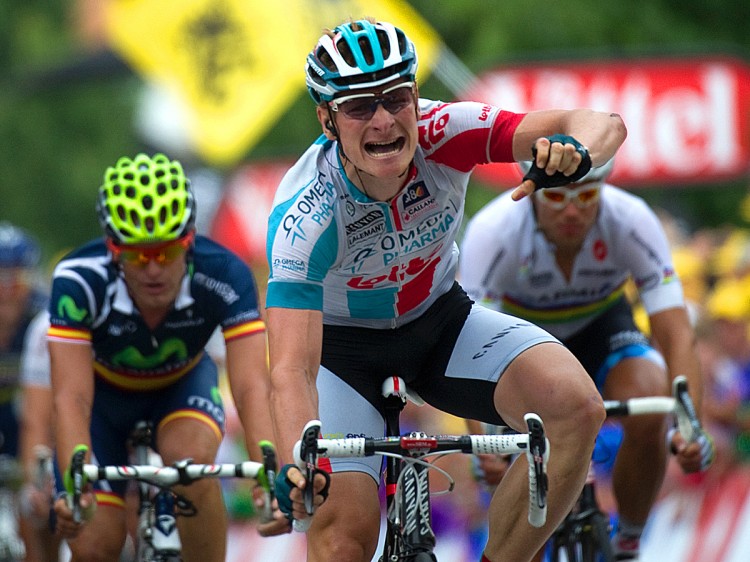 SWEET VICTORY: Andre Greipel (C) roars with joy as he wins Stage Ten of the 2011 Tour de France. (Lionel Bonaventure/AFP/Getty Images)