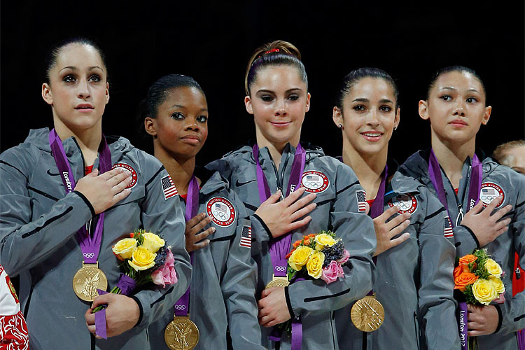 (L-R) Jordyn Wieber, Gabrielle Douglas, McKayla Maroney, Alexandra Raisman and Kyla Ross of the United States listen to the National Anthem after winning the gold medal in the Artistic Gymnastics Women's Team final on Day 4 of the London 2012 Olympic Games. (Jamie Squire/Getty Images)