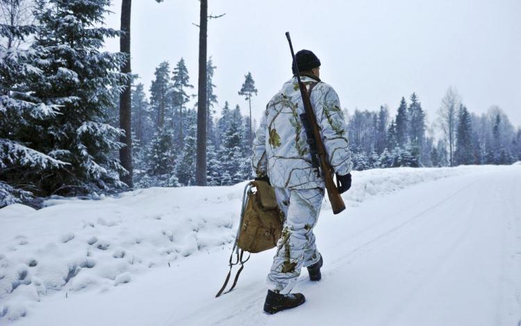 OPEN SEASON: Henrik Widlund is pictured as the wolf hunt season started in Hasselforsreviret, central Sweden, on January 15.  (Anders Wilkund/AFP/Getty Images)