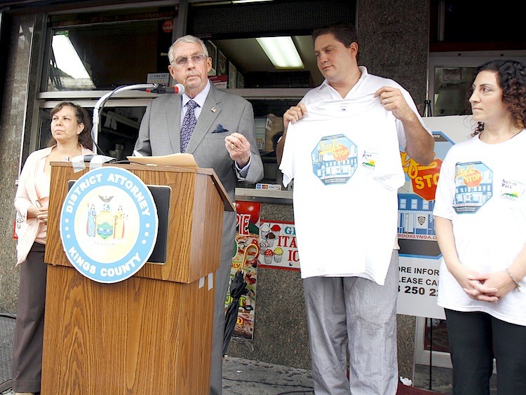 SAFE STOPS: District Attorney Charles J. Hynes announces the Safe Stop program on Tuesday outside Johnny's Pizza, a program participant, in Sunset Park, Brooklyn.  (Ivan Pentchoukov/The Epoch Times)