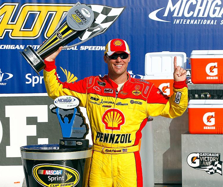 Kevin Harvick, driver of the #29 Richard Childress Racing Shell/Pennzoil Chevrolet, celebrates winning the NASCAR Sprint Cup Series CARFAX 400 at Michigan International Speedway on August 15. (Jason Smith/Getty Images for NASCAR)