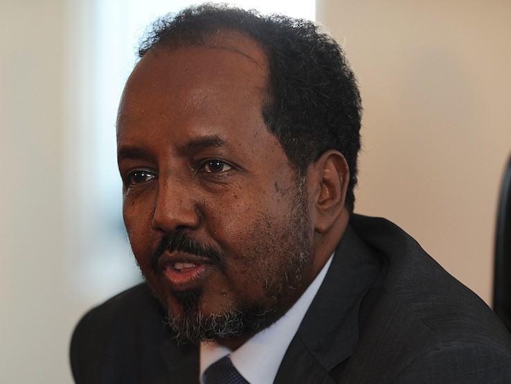 Newly elected Somali president Hassan Sheikh Mohamud speaks to the press after the first blast went off outside the Jazeera hotel on Sept. 12.  Bomb blasts claimed by Islamist rebels rocked the venue of the compound in Mogadishu. (Simon Maina/AFP/GettyImages)