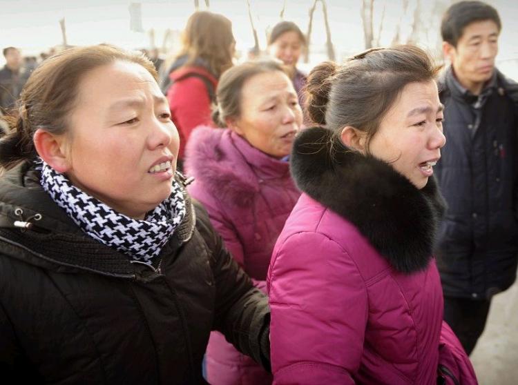 Victims' relatives believe the death toll could be higher than the official number 108 as the number of workers underground was 800 at the time of the blast, instead of the regime's figure of 500.  (Peter Parks/AFP/Getty Images)