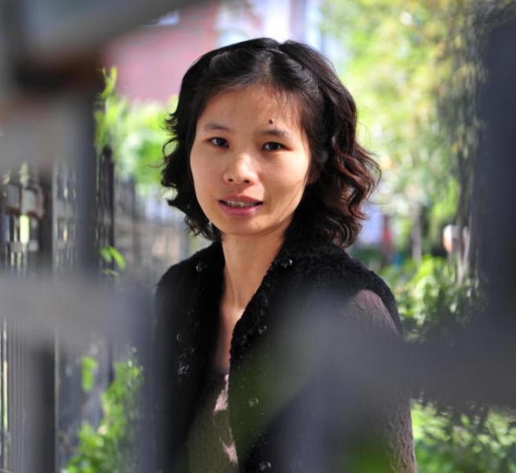 Zeng Jinyan in her barred residential area. (Frederic J Brown/AFP/Getty Image)