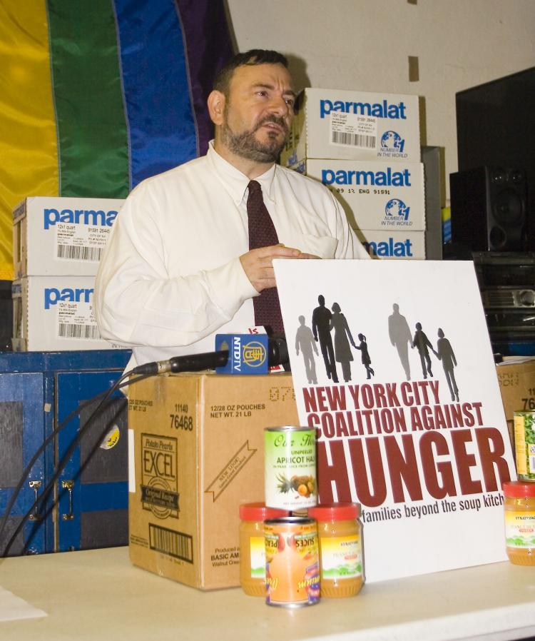 FEED THE POOR: Joel Berg, executive director of the New York City Coalition Against Hunger (NYCCAH), calls for more government to fund the fight against poverty, in response to the new national poverty report. (Helena Zhu The Epoch Times)
