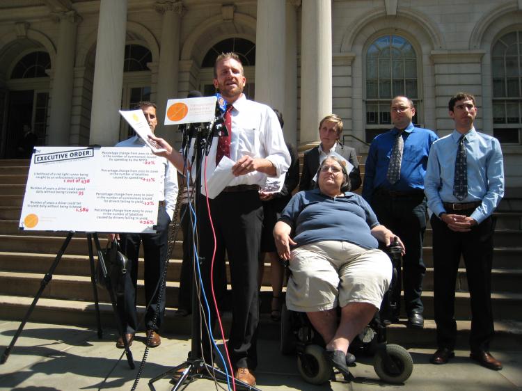Executive Director of Transportation Alternatives Paul Steely White introduced a report on traffic safety in New York on Tuesday. Also pictured (R) Edith Prentiss, vice president of legislative affairs for Disabled In Action. (Stephanie Lam/The Epoch Times)