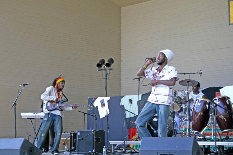 Israel, lead singer of Jamaican Reggae group Maximum Force, performs at Afrikadey! on Saturday. (Neil Campbell/The Epoch Times)