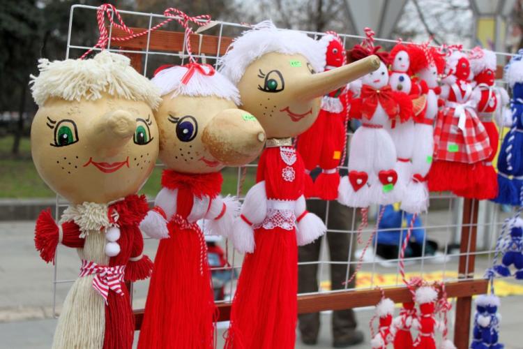 Jolly martenitsas at the Martenitsa bazaar in front of the National Palace of Culture, Sofia, Feb. 28. Martenitsas are red and white yarn ornaments made for 'Baba Marta' (Grandmother March), an ancient Bulgarian holiday beginning March 1 to welcome the forthcoming spring. (Tsanko Tserovsky)