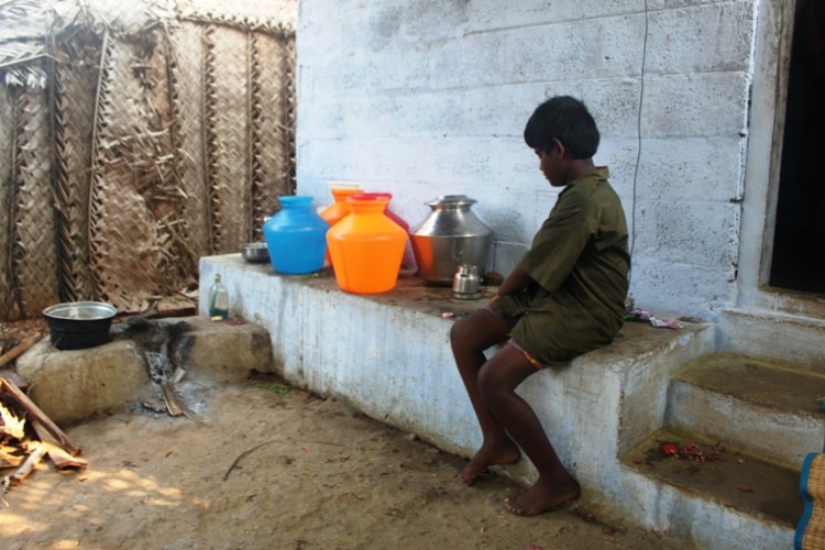 Children in India's Arundhatiyar community often do labor instead of going to school in order to help support their families. (Venus Upadhayaya/The Epoch Times)