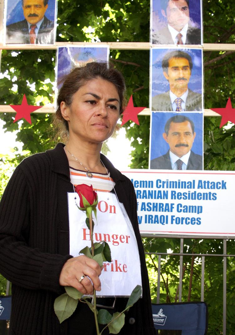 Vahideh Korram-Roudi commemorating the Iranians killed by Iraqi forces in Camp Ashraf during the early days of her hunger strike in front of the U.S. Embassy in Ottawa this summer (Samira Bouaou)