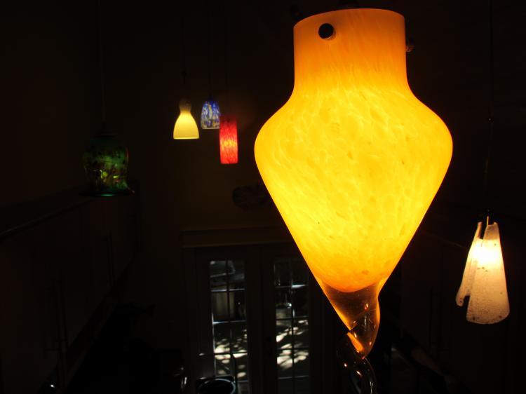 GLOWING PENDANTS: In the age of lighting fixtures, simply having a well-lit space is not enough to make your home appear valuable.  (Adam Miller/The Epoch Times )