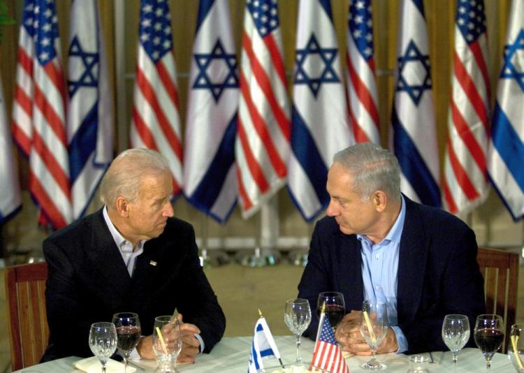 U.S. Vice President Joe Biden (L) and Israeli Prime Minister Benjamin Netanyahu sit down for dinner at the prime minister's residence in Jerusalem on March 9.  (David Furst/AFP/Getty Images)