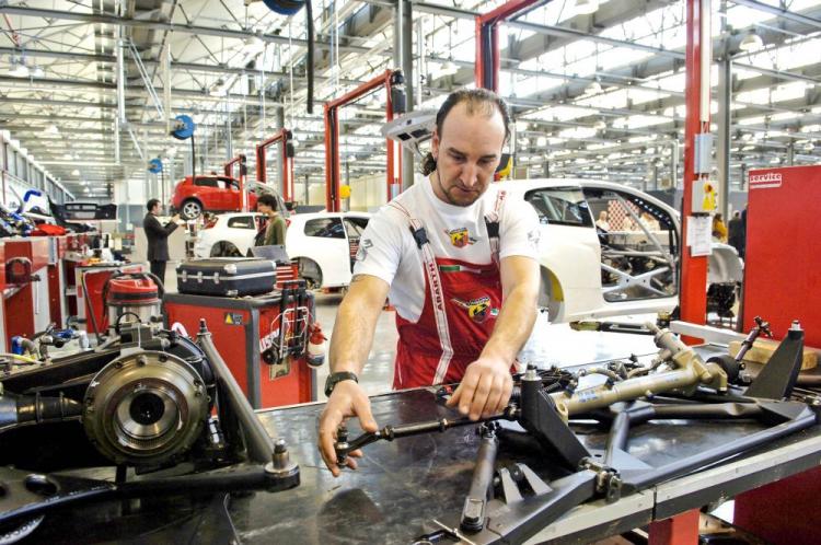 An employee works in a Fiat Abarth factory in Turin, Italy.  (Luigi Bertello/AFP/Getty Images)