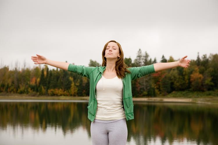 As you stretch, breathe deeply. (Photos.com)