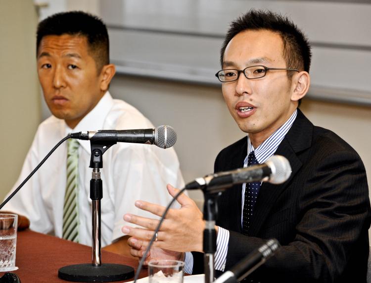 Greenpeace Japan members Junichi Sato (R) and Toru Suzuki speak before the press in Tokyo on September 3, 2010.  (Yoshikazu Tsuno/AFP/Getty Images)