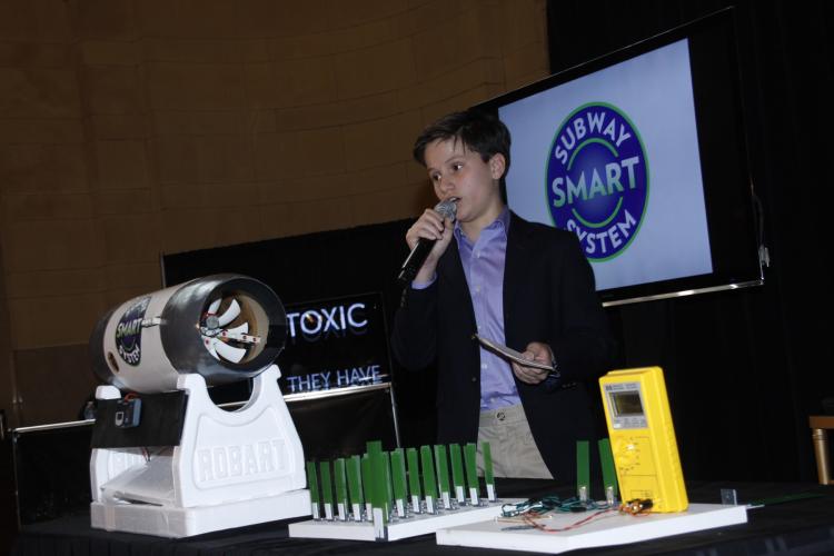 YOUNG INVENTORS: Spokesman and seventh-grader James Savoldelli, from the Horace Mann School, in the Bronx, speaks on the concept of harnessing wind energy to generate electricity Thursday at the student eco-panel presentation for Earth Day celebration. The Subway Smart System team is the regional winner of the 2011 ExploraVision Program. (Shi Lixin/The Epoch Times )