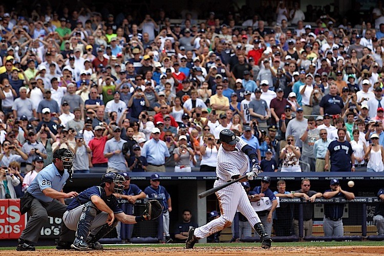 Jeter hits 3000: Derek Jeter belts his 3000 hit into the left field bleachers, off of a 3-2 pitch from Rays starter David Price. He became the 28th MLB player to reach 3000, and only the second to hit a home run as his 3000 hit. Jeter went 5-5 on the day, (Nick Laham/Getty Images Sport)