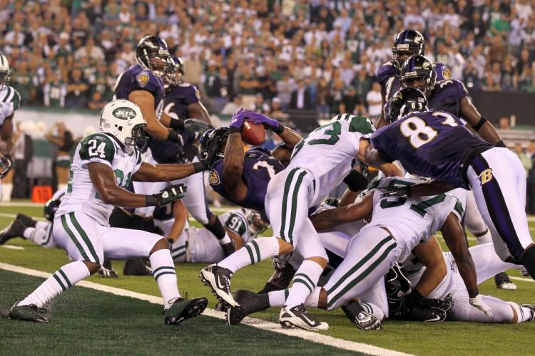 Baltimore's Willis McGahee scores the game's only touchdown. (Jim McIsaac/Getty Images Tags)