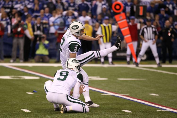 WINNING KICK: Nick Folk sends the New York Jets into a battle against New England. (Jonathan Daniel/Getty Images)