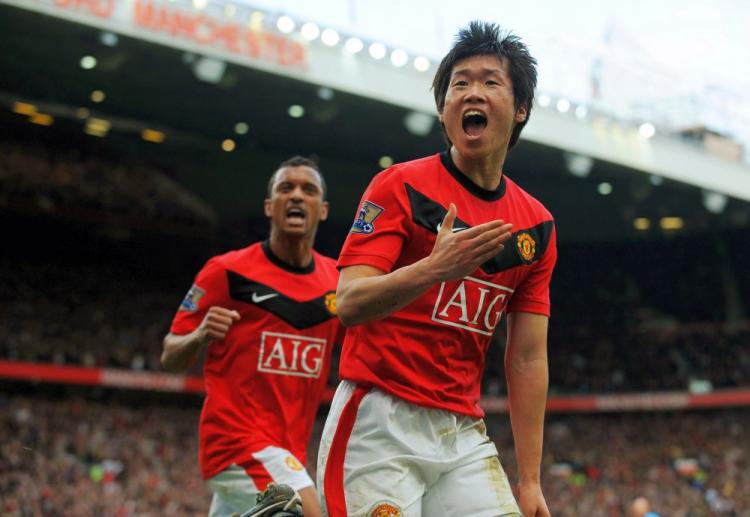 Ji-Sung Park's diving header at the goalmouth gave United three precious points on Sunday. (Michael Regan/Getty Images)
