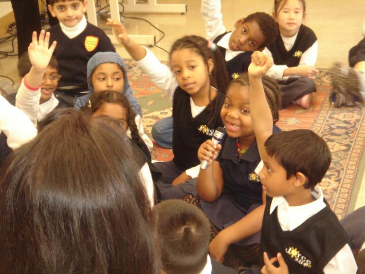 Children at Joyce Public School in Toronto use a microphone to participate in National Show and Tell Day.  (FrontRow)