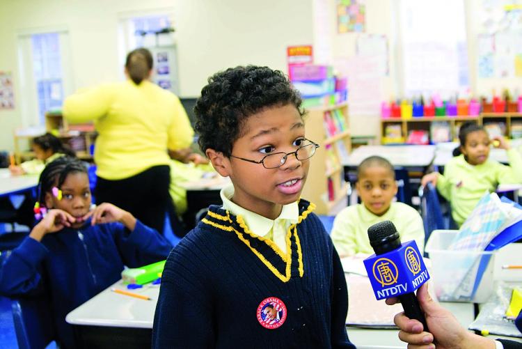 Junlian Manresa, 7, says he wanted to see the Chinese New Year Spectacular and is excited that his class will going. Manresa is a third grader at East Orange Community Charter School. (Joshua Phillip/The Epoch Times)